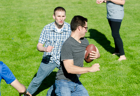 No score is kept during this lighthearted game of touch football.