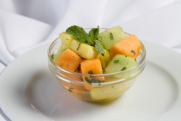 Chunks of Seasonal Fresh Fruit. Possible Fruits: Watermelon, Cantaloupe. Honeydew, Fresh Pineapple, Red and Green Grapes, Strawberries Kiwi, Red and Green Apples, Oranges, Honeydew and/or Cantaloupe.