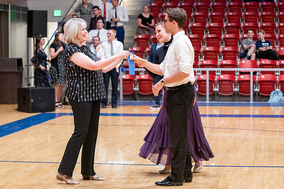 Students perform in a dance competition at the Hart Auditorium.