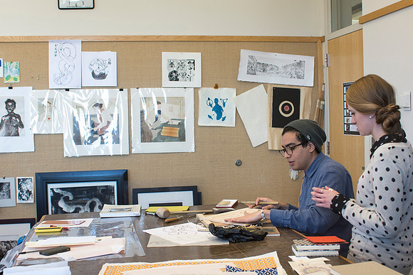 Art students at work in their hands-on print making class.
