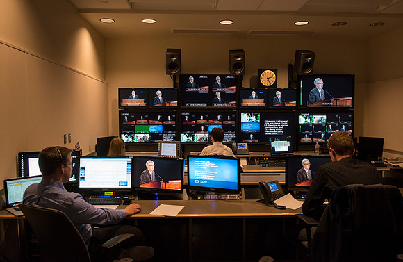Behind the scenes of devotional in the AV_Control Room. Mike Jeffs directs the camera's during devotional.