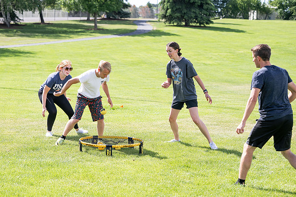 Students participate in the campus spikeball and cornhole tournament.