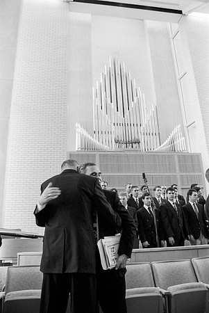 President Steven D. Bennion and President Henry B. Eyring greeting each other at the dedication service of the Taylor Building