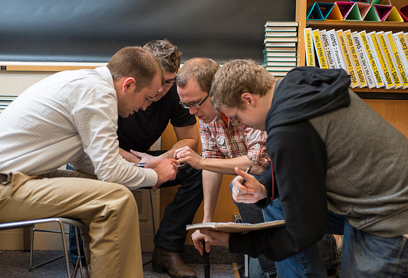 Physics instructor, Les Nelson teaches about projectory and students learn a formula to predict where a launched ball will land.