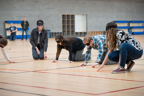 Student Support employees participate in team-building activities in the Hart Gym.