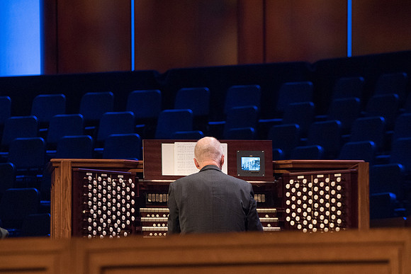 BYU-Idaho Devotional. Guest speaker Elder David A. Bednar and his wife. Pianist before Devotional starts. Fall Semester