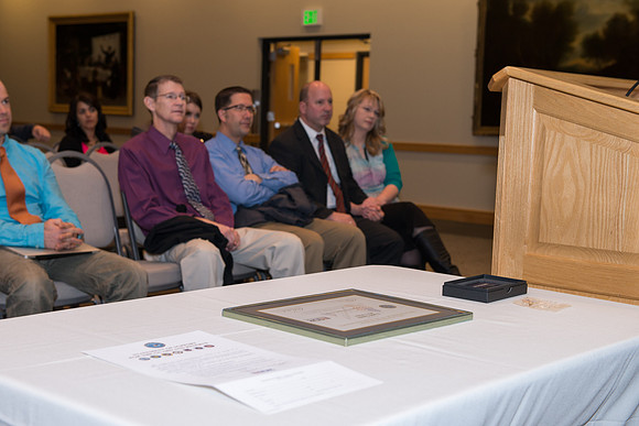 The IT Department on campus gather to support Todd Smith for receiving the Patriotic Employer award in the MC Special Events Room from ESGR (Employeer Support of Guard and Reserve)