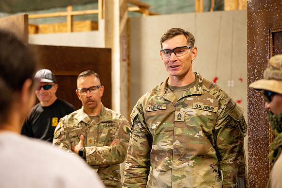 ROTC practices military tatics in an Advantage Airsoft facility.