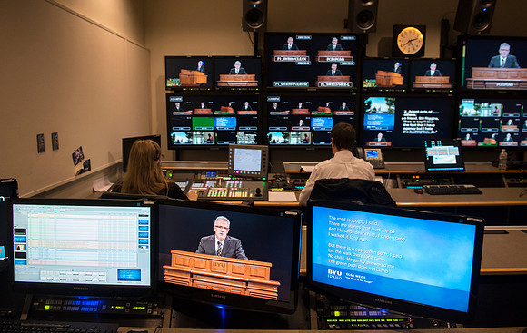 Behind the scenes of devotional in the AV_Control Room. Mike Jeffs directs the camera's during devotional.