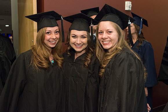 Graduates gather and march in during the processional for April 2014 Graduation ceremonies in the BYU-Idaho Center.