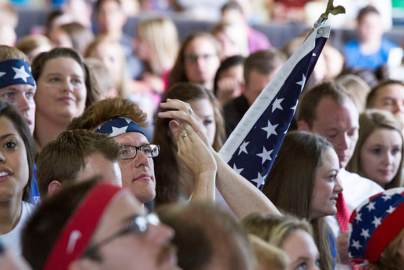 Students gather in the MC Crossroads to watch USA play Germany in Brazil during the 2014 Fifa World Cup as they cheer and anticipate the game.