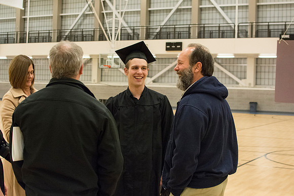 BYU-Idaho Graduate with his family after commencement.
