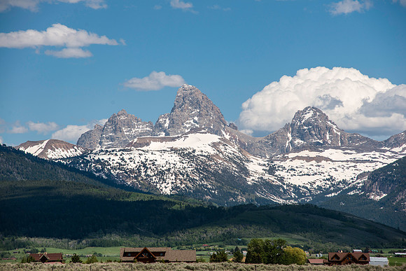 The Grand Teton at 13776 feet is the tallest of the peaks in the Teton Mountain range. View from the Idaho side including the Teton Valley.