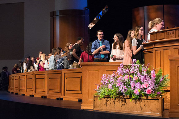 Sister Reyna Aburto interacts with students after her devotional address.