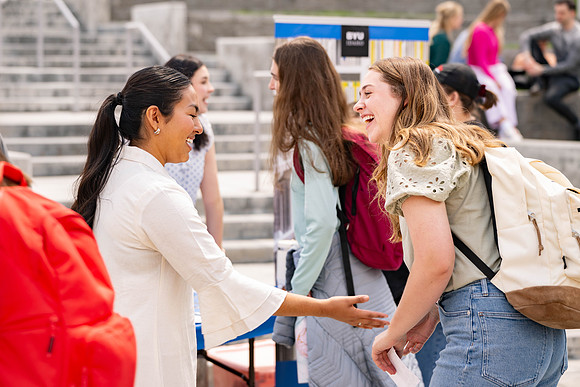 Spirit Fest Booths on campus, students talking and having fun together.