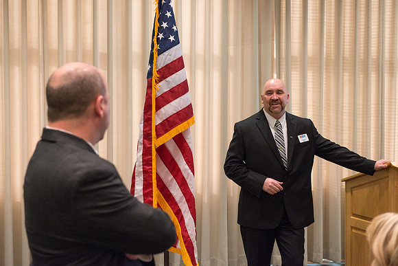 Todd Smith receiving an award on behalf of BYU-Idaho from the Office of the Secretary of Defense for the support BYU-Idaho has given to Peter Stilling while he has been serving in the Guard. Awarded b