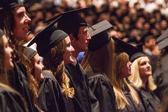 Graduating students from the 2014 Spring Semster gather in the I-Center for commencement. Photo by Tyler Rickenbach