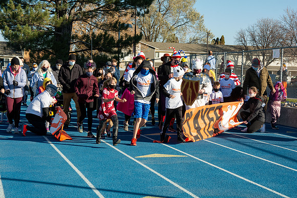 BYU-Idaho employees and their families enjoy a beautiful fall day at the stadium track.
