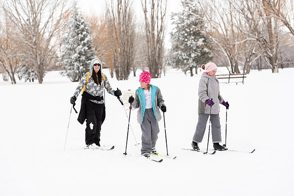 Volunteers and Community members enjoying Winter Fest at the Teton Lakes Golf Course.