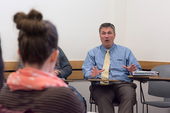 Brother Roberts talks with his Sociology class during the 2014 Spring Semester.