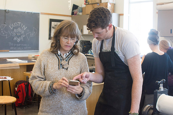 Art students at work in their hands-on print making class.
