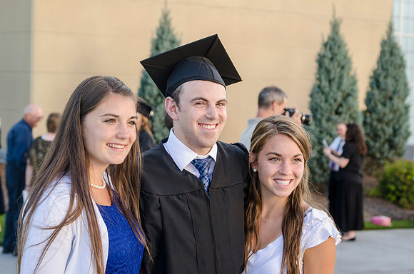 Graduates meet outside on the BYU-Idaho campus after commencement to take pictures before convocation starts. Photo by Tyler Rickenbach