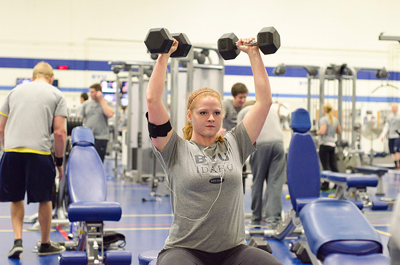 Students workout in the fitness center in the Hart building.