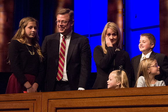 Clark G. Gilbert and his family react to the news of their new calling. Taken by Erik Hill.