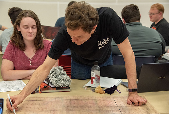 Students playing Dungeons and Dragons during Game Night at the Manwaring Center.