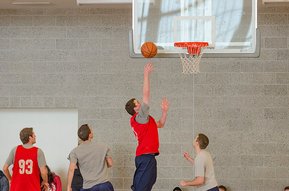 BYU-Idaho students playing basketball at the I-Center on campus