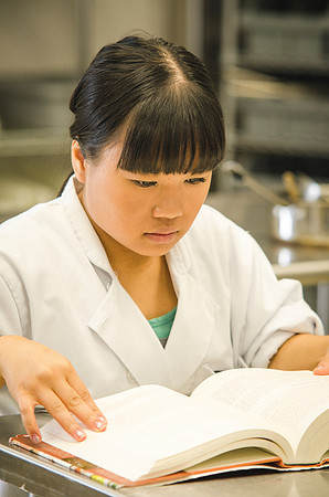Students learn cooking techniques in their Introductory Foods class.
