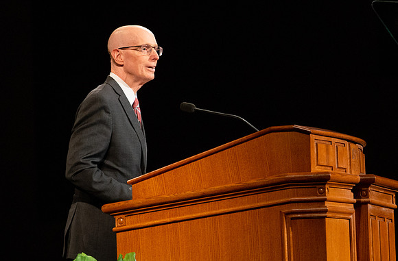 President Eyring introducing Elder Stevensen and his wife.