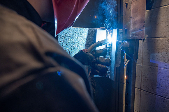 Students working in the welding lab.