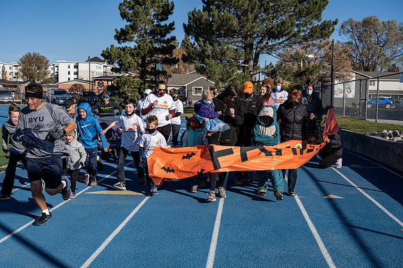 BYU-Idaho employees and their families enjoy a beautiful fall day at the stadium track.