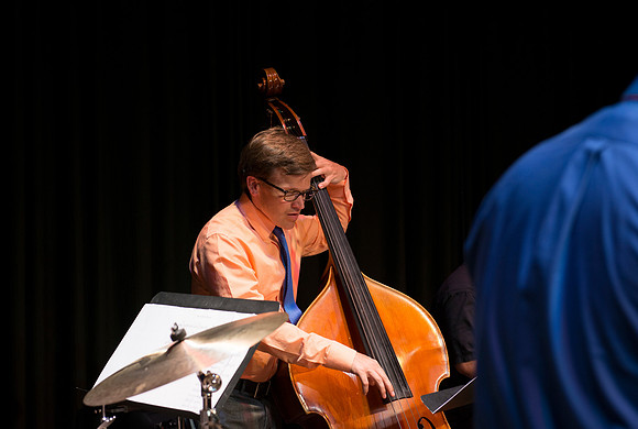 Aaron Miller on upright bass.