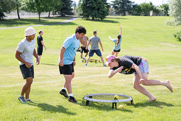 Students participate in the campus spikeball and cornhole tournament.