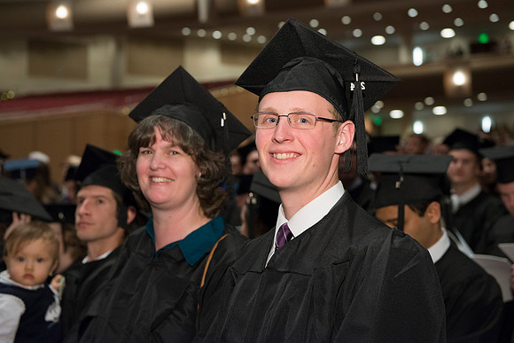 Graduates gather and march in during the processional for April 2014 Graduation ceremonies in the BYU-Idaho Center.