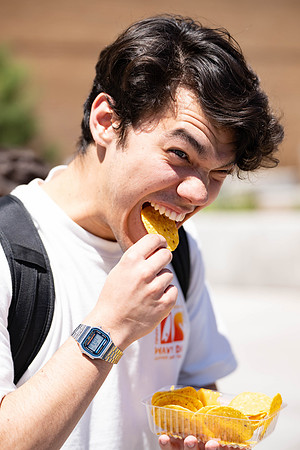 Spirit Fest Booths on campus, students talking and having fun together.