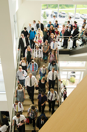 Students walking downstairs in the I-Center after Devoitional.