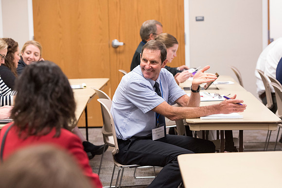 Faculty members come together in preparation of the new school year.