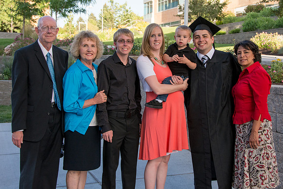 Faculty, family and graduates around campus after the commencement ceremony. Photo by Ryan Chase