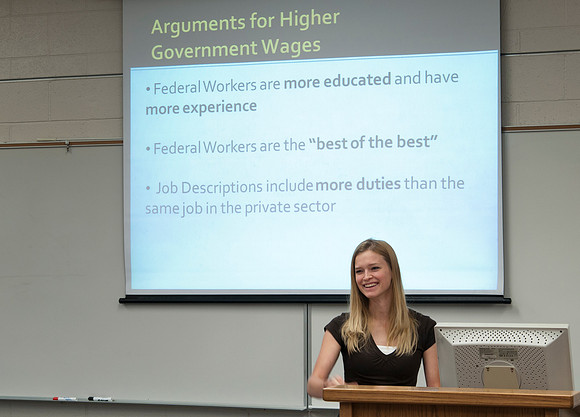 Students give presentations in Rick Hirschi's Economics class.