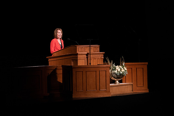 Amanda Kingsford speaks in devotional to an empty auditorium due to Covid-19 restrictions.