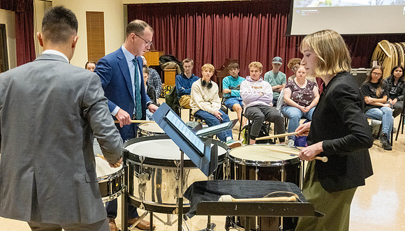 Members of the United States Marine Band work with students in a Masters class.