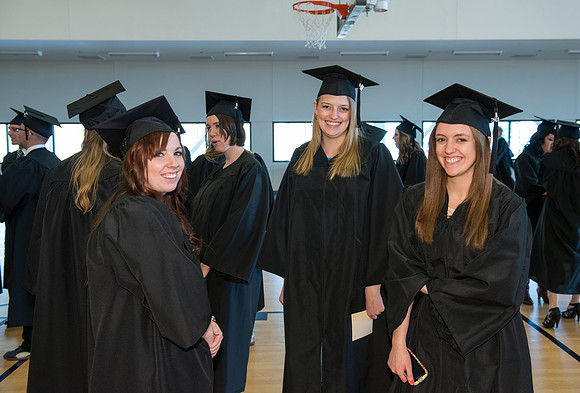 Graduates gather and march in during the processional for April 2014 Graduation ceremonies in the BYU-Idaho Center.