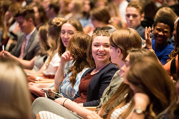 Students gathering before the devotional.