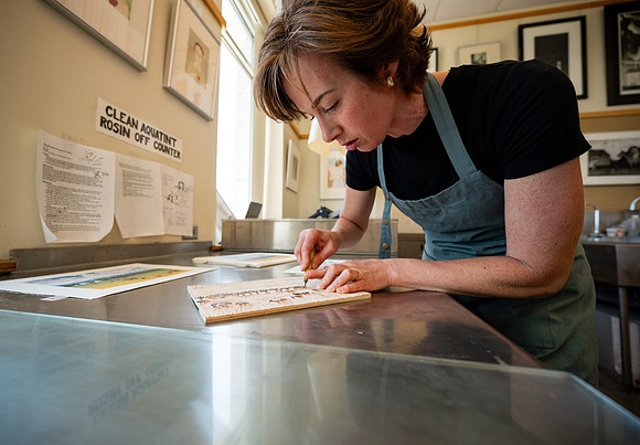Students working in Printmaking 2 in the Spori Building.
