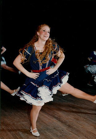 Folk dancers perform.