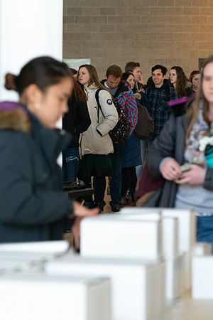 Students pick up their $2 box lunch after devotional for the first time.
