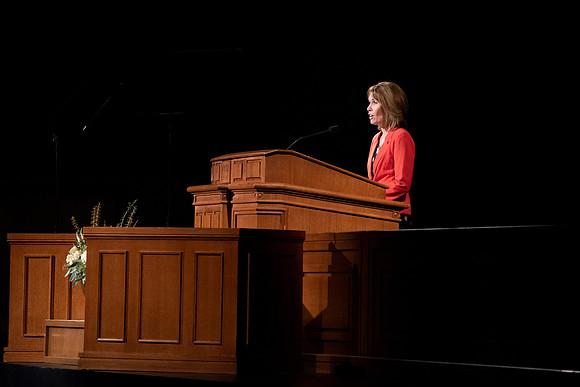 Amanda Kingsford speaks in devotional to an empty auditorium due to Covid-19 restrictions.